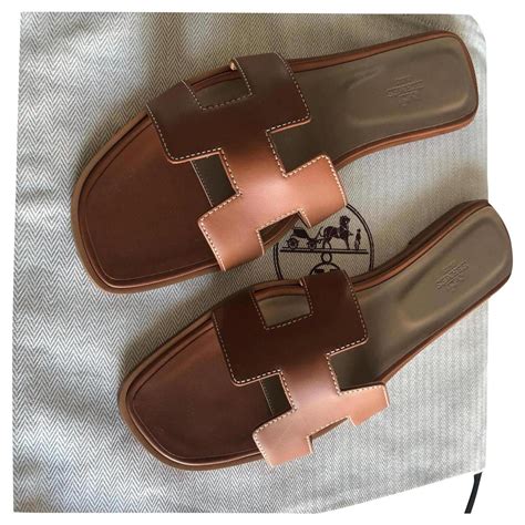 sandales oran gold hermes|Hermes oran sandals price.